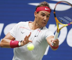 epa10162622 Rafael Nadal of Spain hits a return to Frances Tiafoe of the United States in their fourth round match during the US Open Tennis Championships at the USTA National Tennis Center in in Flushing Meadows, New York, USA, 05 September 2022. The US Open runs from 29 August through 11 September.  EPA/CJ GUNTHER