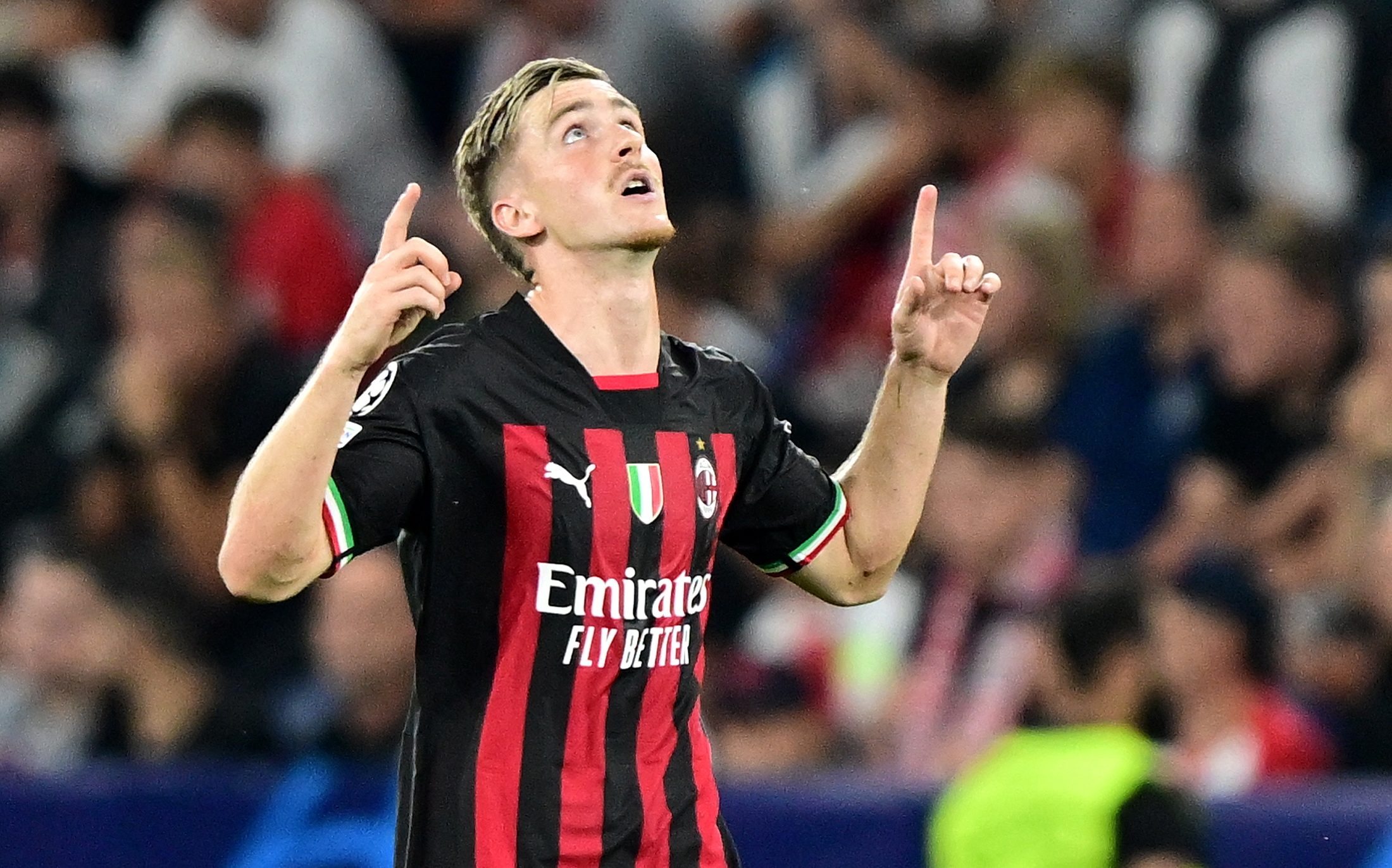 epa10165315 Alexis Saelemaekers of Milan celebrates after scoring the 1-1 during the UEFA Champions League group E match between Red Bull Salzburg and AC Milan in Salzburg, Austria, 06 September 2022.  EPA/CHRISTIAN BRUNA