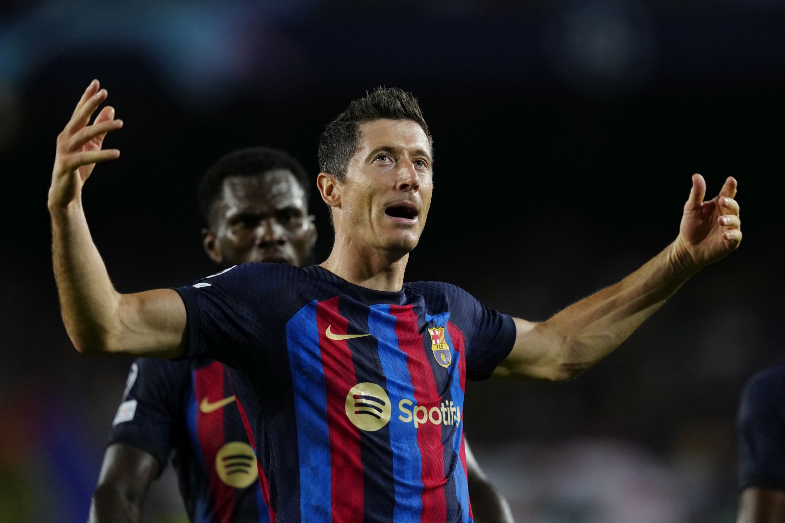 epa10168254 FC Barcelona's Robert Lewandowski celebrates after scoring the 2-0 lead during a UEFA Champions League Group B soccer match between FC Barcelona and Viktoria Pilsen at Camp Nou stadium in Barcelona, Spain, 07 September 2022.  EPA/ENRIC FONTCUBERTA
