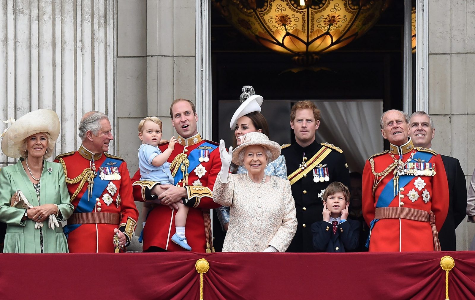 epa10170507 (FILE) - A picture dated 13 June 2015 shows Britain's Queen Elizabeth II (C) and members of the Royal Family on the balcony of Buckingham Palace following the traditional Trooping the Colour Ceremony in London, Britain (reissued 08 September 2022). According to a statement issued by Buckingham Palace on 08 September 2022, Britain's Queen Elizabeth II has died at her Scottish estate, Balmoral Castle, on 08 September 2022. The 96-year-old Queen was the longest-reigning monarch in British history. From left are: Camilla, Duchess of Cornwall, Prince Charles, Prince George, Prince William, Duke of Cambridge, Catherine, Duchess of Cambridge, Prince Harry, Prince Philip, Duke of Edinburgh and Prince Andrew. Boy bottom right is unidentified.  EPA/FACUNDO ARRIZABALAGA