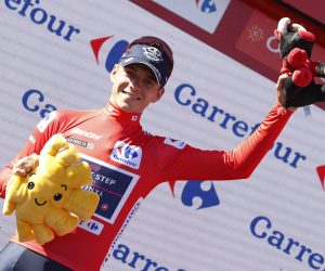 epa10173929 Belgian rider Remco Evenepoel of the Quick-Step Alpha Vinyl Team celebrates on the podium after retaining the overall leader's red jersey following the 19th stage of the Vuelta a Espana cycling tour over 138.3km around Talavera de la Reina, central Spain, 09 September 2022.  EPA/Javier Lizon