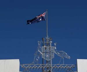 epa10176961 The Australian flag is seen at full mast after the Proclamation of King Charles III, on the forecourt of Parliament House, in Canberra, Australia, 11 September 2022. The monarch's representative in Australia proclaimed the ascension of Britain's King Charles III as mourning continues around the nation for Queen Elizabeth II.  EPA/MICK TSIKAS AUSTRALIA AND NEW ZEALAND OUT