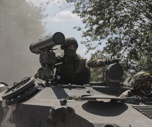 epa10179396 A handout photo made available by the Russian Defence Ministry press-service on 12 September 2022 shows Russian servicemen driving an armoured personnel carrier (APC) at an undisclosed location in the Kherson region, Ukraine. On 24 February 2022 Russian troops entered the Ukrainian territory in what the Russian president declared a 'Special Military Operation', starting an armed conflict that has provoked destruction and a humanitarian crisis.  EPA/RUSSIAN DEFENCE MINISTRY PRESS SERVICE HANDOUT --  BEST QUALITY AVAILABLE -- MANDATORY CREDIT -- HANDOUT EDITORIAL USE ONLY/NO SALES