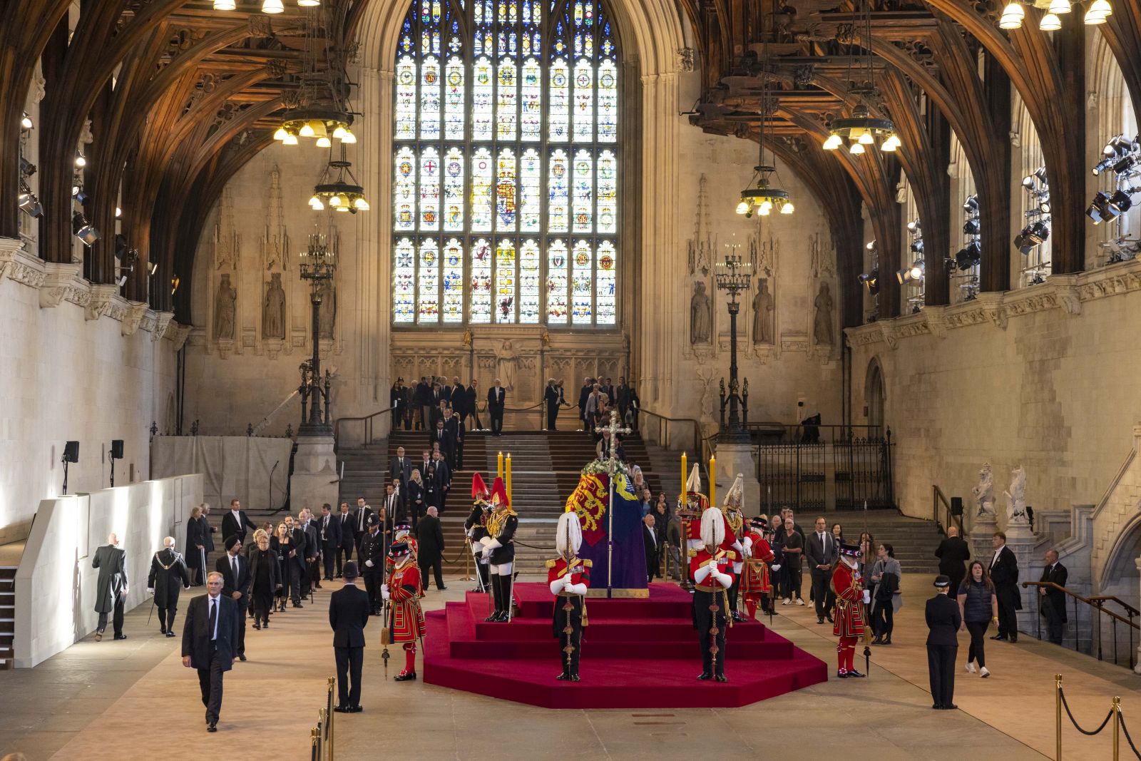 epa10184705 A handout photograph released by the UK Parliament shows the first members of the public attending the Lying-in-State of Britain's Queen Elizabeth II at the Palace of Westminster in London, Britain, 14 September 2022. The queen's lying in state will last for four days, ending on the morning of the state funeral on the 19 September.  EPA/UK PARLIAMENT/ROGER HARRIS HANDOUT -- MANDATORY CREDIT: UK PARLIAMENT/ROGER HARRIS -- HANDOUT EDITORIAL USE ONLY/NO SALES