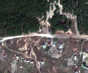 epa10189375 A handout satellite image made available by Maxar Technologies shows artillerty pieces deployed near the entrance to the cemetary in Izyum, Ukraine, 08 April 2022 (issued 17 September 2022). According to statements from Ukraine President Volodymyr Zelensky, bodies found in a mass burial site near Izyum, an area recently taken back from Russian forces, show signs of torture. Governor of Kharkiv Oblast Oleg Synegubov stated that civilians were among the dead, and some of the more than 440 bodies found buried at the site had their hands bound behind their backs.  EPA/MAXAR TECHNOLOGIES HANDOUT -- MANDATORY CREDIT: SATELLITE IMAGE 2022 MAXAR TECHNOLOGIES -- THE WATERMARK MAY NOT BE REMOVED/CROPPED -- HANDOUT EDITORIAL USE ONLY/NO SALES