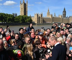 epa10189695 Britain's William, Prince of Wales (R) greets people in the queue to see Britain's late Queen Elizabeth II lying in state on the South Bank in London, Britain, 17 September 2022.  The queen's funeral will be held on 19 September, following four days of lying in state inside Westminster Hall.  EPA/NEIL HALL