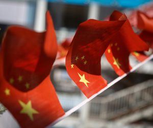 epa10196754 Flags of China flutter at a mall in Beijing, China, 21 September 2022. The European Chamber of Commerce warned China that firms are losing confidence in the country as an investment destination, citing erratic COVID-19 policy shifts as one of its reasons.  EPA/MARK R. CRISTINO
