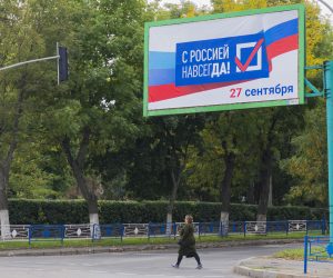 epa10199036 A referendum billboard 'With Russia forever. 27 Sepetmber' during a campaign rally for a referendum to join the Russian Federation in downtown Luhansk, Ukraine, 22 September 2022. The parliaments of the self-proclaimed Luhansk and Donetsk Peoples Republics as well as the military-civilian administrations controlled by Russia of the Kherson and Zaporizhzhia regions decided to hold referendums on the future of these territories. On 24 February 2022 Russian troops entered the Ukrainian territory in what the Russian president declared a 'Special Military Operation', starting an armed conflict that has provoked destruction and a humanitarian crisis.  EPA/STRINGER