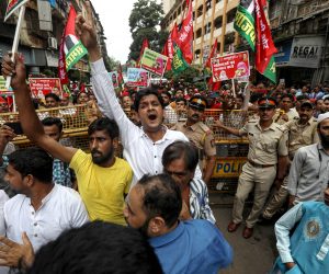 epa10198943 Samajwadi Party activists protest against the Gujarat Government in Mumbai, India, 22 September 2022. 11 convicts who were sentenced to life imprisonment for the Bilkis Bano gang rape and murder case walked out of jail after Gujarat Government approved their remission application.  EPA/DIVYAKANT SOLANKI
