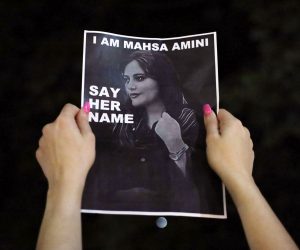 epa10206580 Protesters hold a vigil for 22-year-old Mahsa Amini at Sydney Town Hall, Australia, 25 September 2022. Protests have erupted in Iran and across the world after the death of Mahsa Amini who died last week in custody of Iran's morality police.  EPA/ROUNAK AMINI  AUSTRALIA AND NEW ZEALAND OUT