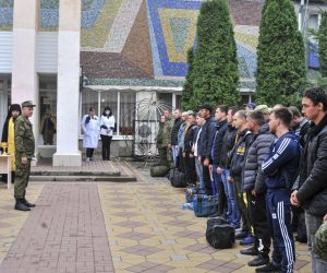 epa10207764 Russian conscripted men attend a farewell ceremony outside a recruiting office in Bataysk, Rostov region, Russia, 26 September 2022. Russian President Putin has signed a decree on partial mobilization in the Russian Federation. Russian Defense Minister Sergei Shoigu said that 300,000 people would be called up as part of partial mobilization. On 24 February 2022 Russian troops entered the Ukrainian territory in what the Russian president declared a 'Special Military Operation', starting an armed conflict that has provoked destruction and a humanitarian crisis.  EPA/ARKADY BUDNITSKY