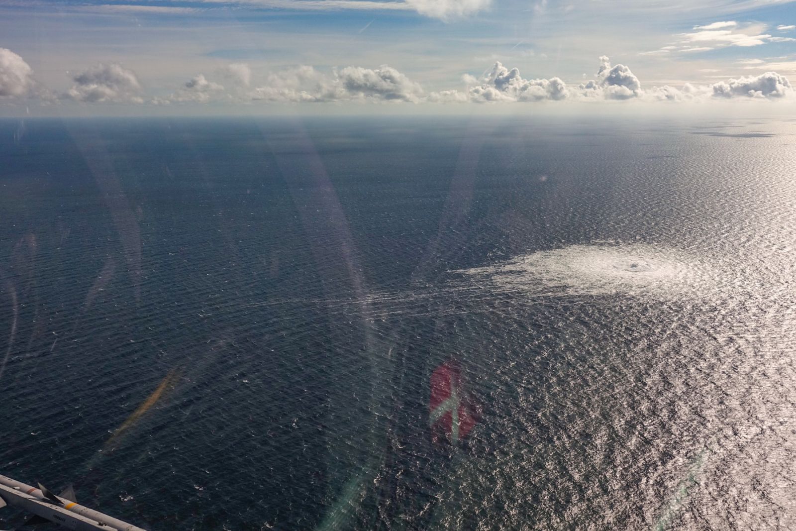 epa10209594 A handout photo taken from a Danish F-16 jet on 27 September 2022 and made available by the Danish Defence Command shows a gas leak of the Nord Stream 2 pipeline off Bornholm, Denmark, Baltic Sea. The Danish energy agency confirmed 27 September 2022 three gas leaks on the Nord Stream 1 and 2 pipelines.  EPA/Danish Defence Command / HANDOUT  HANDOUT EDITORIAL USE ONLY/NO SALES