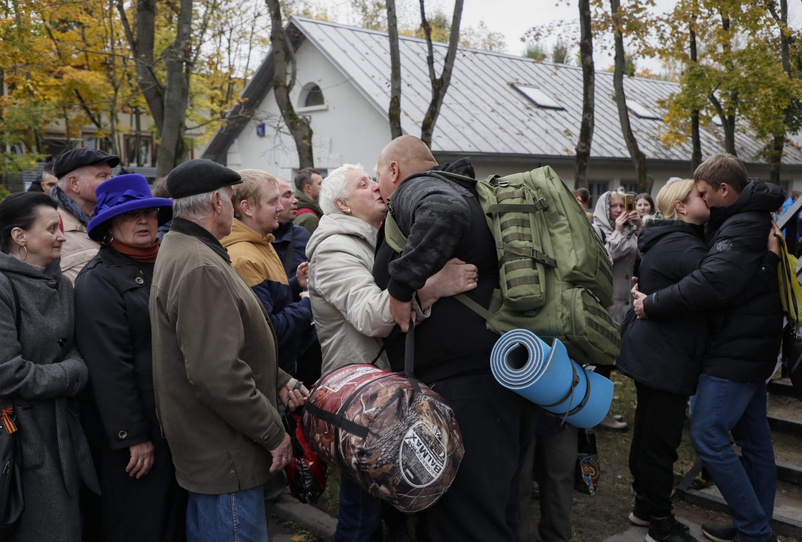 epa10213464 Russian conscripted men say goodbye to relatives at a recruiting office during Russia's partial military mobilization in Moscow, Russia, 29 September 2022. Russian President Putin announced in a televised address to the nation on 21 September, that he signed a decree on partial mobilization in the Russian Federation due to the conflict in Ukraine. Russian Defense Minister Shoigu said that 300,000 people would be called up for service as part of the move.  EPA/YURI KOCHETKOV