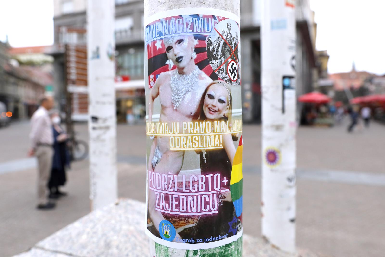 09.09.2022., Zagreb - Na Trgu bana Jelacica pojavili su se provokativni plakati koji, sudeci po grbu grada Zagreba i tekst Zagreb za jednakost, pokusavaju gradsku vlast povezati sa pedofilijom i povecanim priljevom izbjeglica u metropolu. Uz provokativne fotografije, na jednom plakatu pise "Podrzite LGBTQ+ zajednicu - Djeca imaju pravo na ljubav s odraslima!", a na drugom "Privatimo migrante zajedno - Dobro dosli novi hrvati".
 Photo: Patrik Macek/PIXSELL