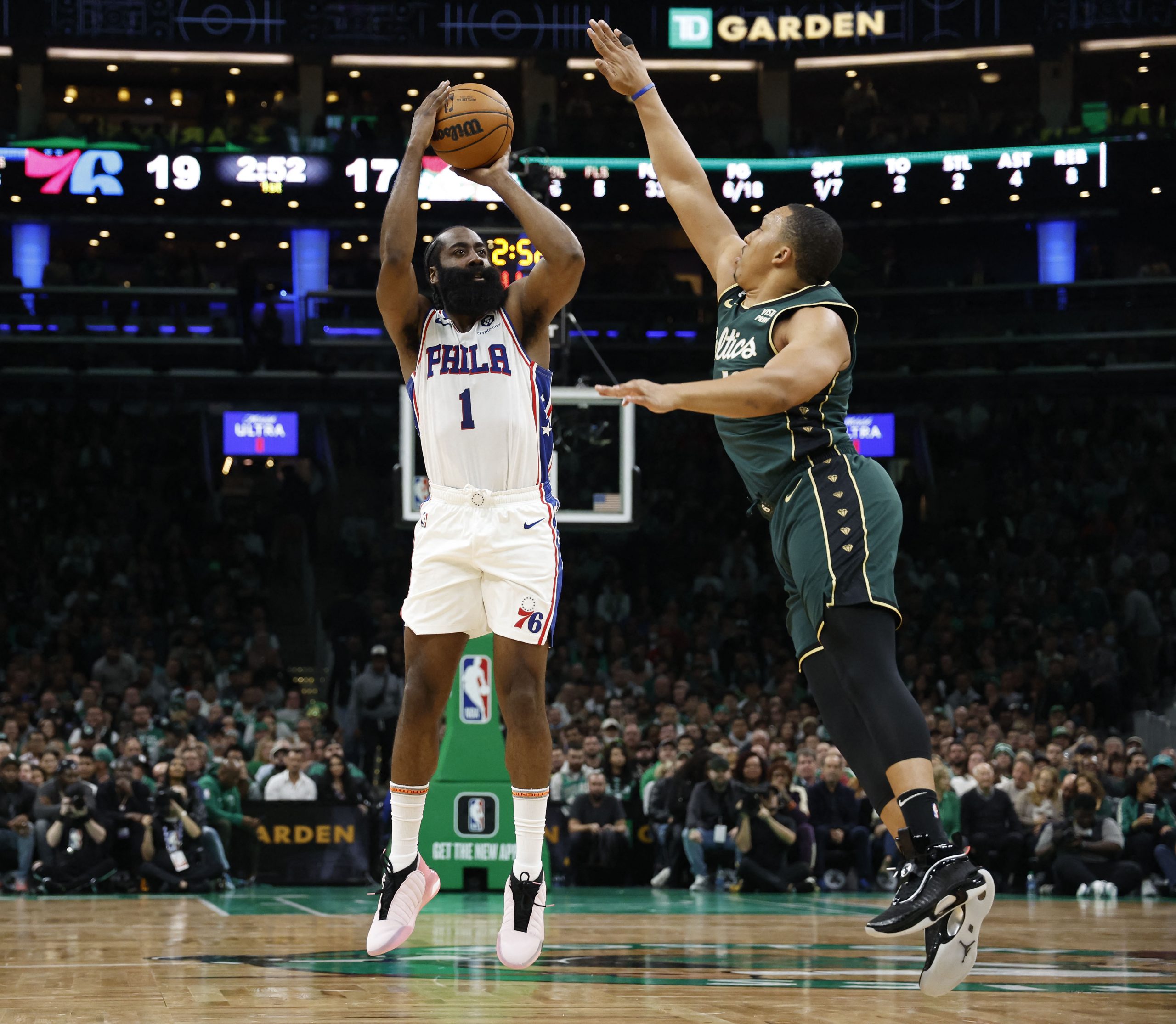 Oct 18, 2022; Boston, Massachusetts, USA; Philadelphia 76ers guard James Harden (1) shoots against Boston Celtics forward Grant Williams (12) during the first quarter at TD Garden. Mandatory Credit: Winslow Townson-USA TODAY Sports