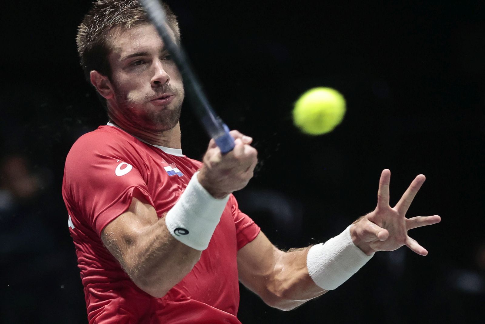 epa10186150 Borna Coric of Croatia in action against Mikael Ymer of Sweden during the Davis Cup Finals group A tie between Croatia and Sweden in Casalecchio, near Bologna, Italy, 15 September 2022.  EPA/ELISABETTA BARACCHI