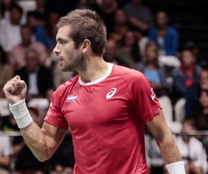 epa10186454 Borna Coric of Croatia celebrates after defeating Mikael Ymer of Sweden during the Davis Cup Finals group A tie between Croatia and Sweden in Casalecchio, near Bologna, Italy, 15 September 2022.  EPA/ELISABETTA BARACCHI