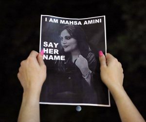 epa10206580 Protesters hold a vigil for 22-year-old Mahsa Amini at Sydney Town Hall, Australia, 25 September 2022. Protests have erupted in Iran and across the world after the death of Mahsa Amini who died last week in custody of Iran's morality police.  EPA/ROUNAK AMINI  AUSTRALIA AND NEW ZEALAND OUT