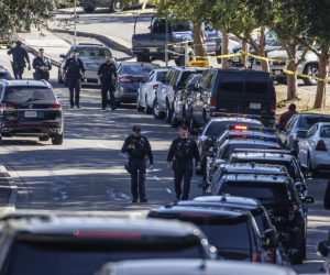 epa10212504 Law enforcement work at the scene of a shooting at a complex which houses several schools including Sojourner Truth Independent Study, in East Oakland, California, USA, 28 September 2022.  EPA/PETER DASILVA