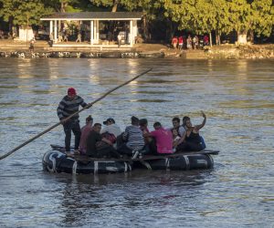 epa10216257 Groups and families of Venezuelans cross the Suchiate River on rafts, which divides Guatemala from Mexico, in Tecun Uman, Guatemala, 28 September 2022 (Issued 30 September 2022). At least 2,000 Venezuelan migrants have tried to cross Guatemala in September as part of their journey to the United States, on a route plagued by theft and pain, but which is transcendental to reach the 'American dream'. Several Venezuelan migrants who pass through Ayutla, before entering Mexico, agreed that the hardest part of the road was crossing the Darien region. Similarly, others assured Efe that the Guatemalan security forces allegedly stripped them of their cash to let them continue their route and others were attacked by assailants on their way through the capital of the Central American country.  EPA/Esteban Biba