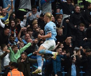 epa10219450 Erling Haaland of Manchester City celebrates after scoring a goal during the English Premier League soccer match between Manchester City and Manchester United at Etihad Stadium in Manchester, Britain, 02 October 2022.  EPA/PETER POWELL EDITORIAL USE ONLY. No use with unauthorized audio, video, data, fixture lists, club/league logos or 'live' services. Online in-match use limited to 120 images, no video emulation. No use in betting, games or single club/league/player publications