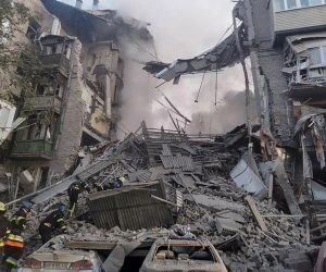 epa10226300 A handout photo released by the press service of the State Emergency Service of Ukraine shows Ukrainian rescuers working at the site of a damaged residential building after shelling in the city of Zaporizhzhia, southeastern Ukraine, 06 October 2022, amid Russia's military invasion. At least two people were killed and six others injured in missile strikes, the Deputy Head of the Presidential Office Kyrylo Tymoshenko said. Russian troops entered Ukraine on 24 February 2022 starting a conflict that has provoked destruction and a humanitarian crisis.  EPA/STATE EMERGENCY SERVICE OF UKRAI -- BEST QUALITY AVAILABLE -- MANDATORY CREDIT: STATE EMERGENCY SERVICE OF UKRAINE -- HANDOUT EDITORIAL USE ONLY/NO SALES