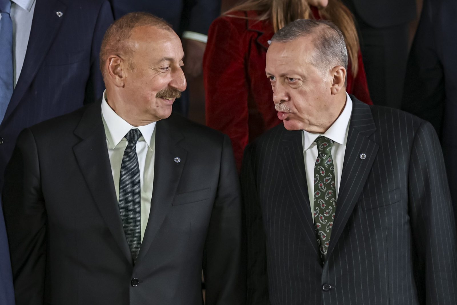 epa10226820 President of Azerbaijan Ilham Aliyev (L) and Turkish President Recep Tayyip Erdogan (R) attend a family photo during the Meeting of the European Political Community in Prague, Czech Republic, 06 October 2022. The first meeting of the European Political Community brings together leaders from across the continent including non EU members countries with the aims to foster political dialogue and cooperation and to strengthen the continent's security, stability and prosperity, a statement by the European Council reads.  EPA/MARTIN DIVISEK