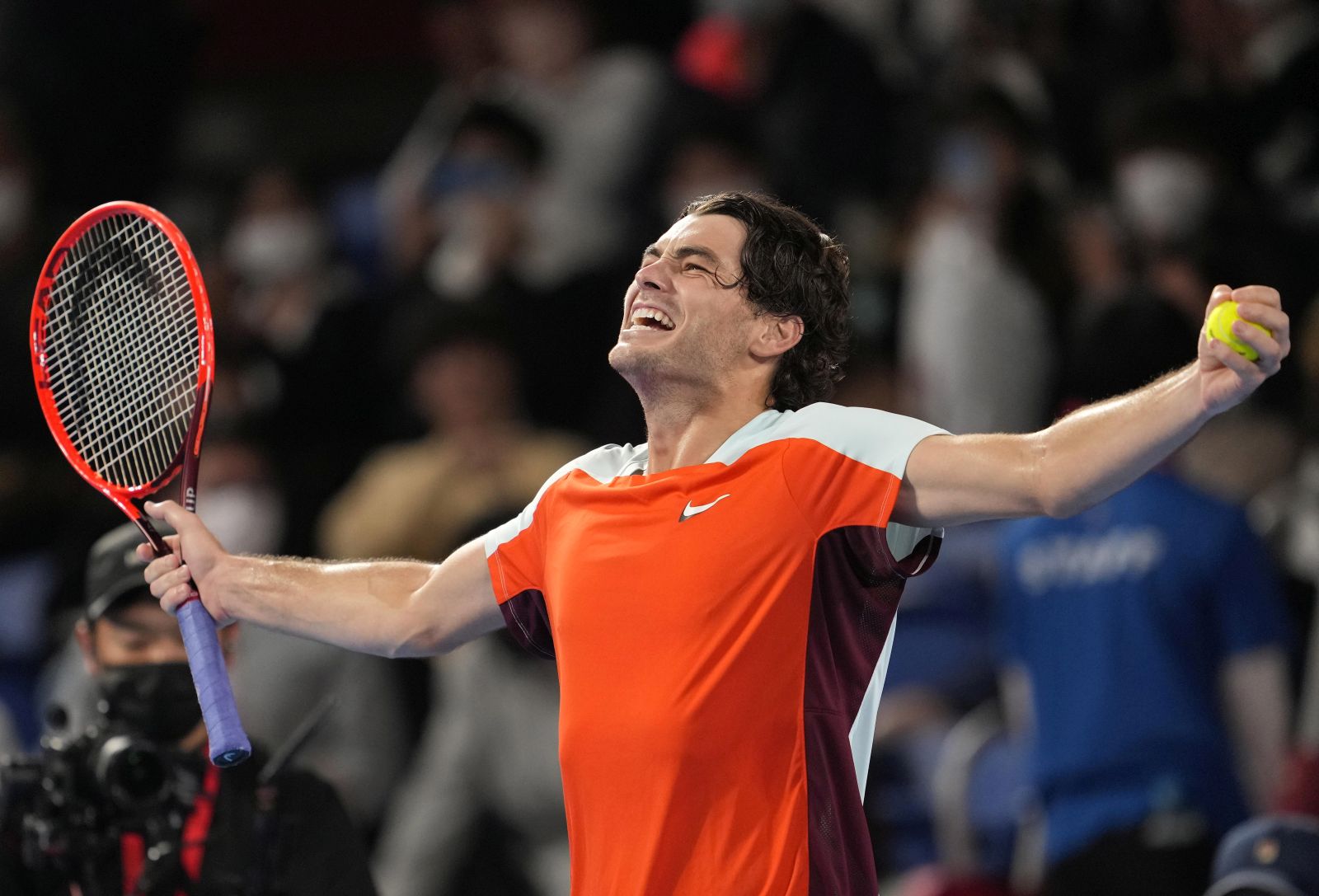 epa10230208 Taylor Fritz of the United States celebrates after defeating Denis Shapovalov of Canada during the semifinals of Japan Open tennis tournament in Tokyo, Japan, 08 October 2022. Fritz  advanced to the final.  EPA/KIMIMASA MAYAMA