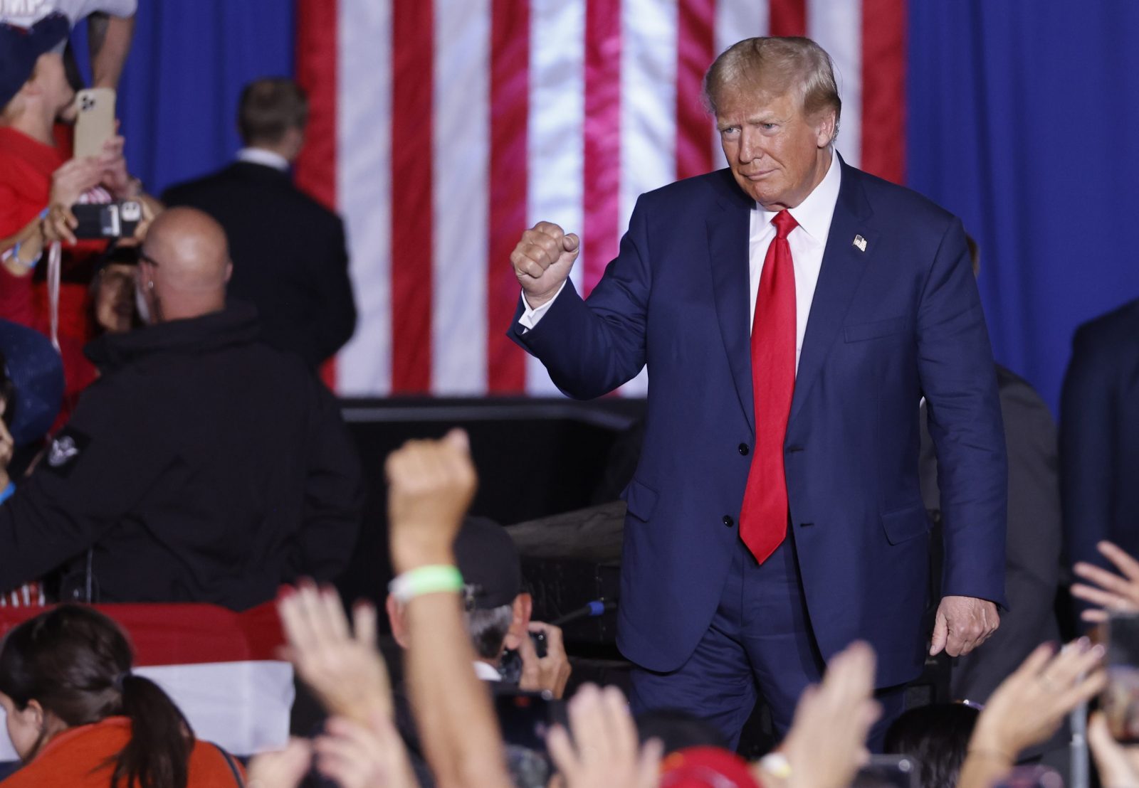 epa10232079 Former US President Donald J. Trump greets supporters at the start of the Save America rally at the Minden-Tahoe Airport in Minden, Nevada, USA, 08 October 2022. Trump is holding rallys for congressional candidates he supports in the run-up to the mid-term elections.  EPA/PETER DASILVA
