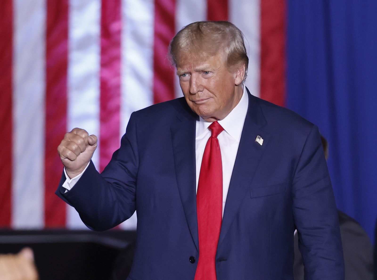 epa10232079 Former US President Donald J. Trump greets supporters at the start of the Save America rally at the Minden-Tahoe Airport in Minden, Nevada, USA, 08 October 2022. Trump is holding rallys for congressional candidates he supports in the run-up to the mid-term elections.  EPA/PETER DASILVA