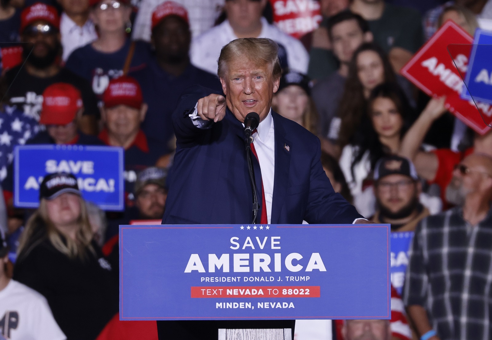epa10232076 Former US President Donald J. Trump addresses supporters during the Save America rally at the Minden-Tahoe Airport in Minden, Nevada, USA, 08 October 2022. Trump is holding rallys for congressional candidates he supports in the run-up to the mid-term elections.  EPA/PETER DASILVA