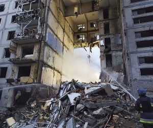 epa10232217 A handout photo made available by the Ukrainian State Emergency Service shows Ukrainian rescuers work on the shelling place of residential building in Zaporizhzhia, Ukraine, 09 October 2022. At least 17 persons were killed and 49 injured as Anatoly Kurtev, Secretary of the Zaporizhzhia City Council said. Russian troops entered Ukraine on 24 February 2022 starting a conflict that has provoked destruction and a humanitarian crisis.  EPA/UKRAINIAN STATE EMERGENCY SERVICE HANDOUT HANDOUT  HANDOUT EDITORIAL USE ONLY/NO SALES