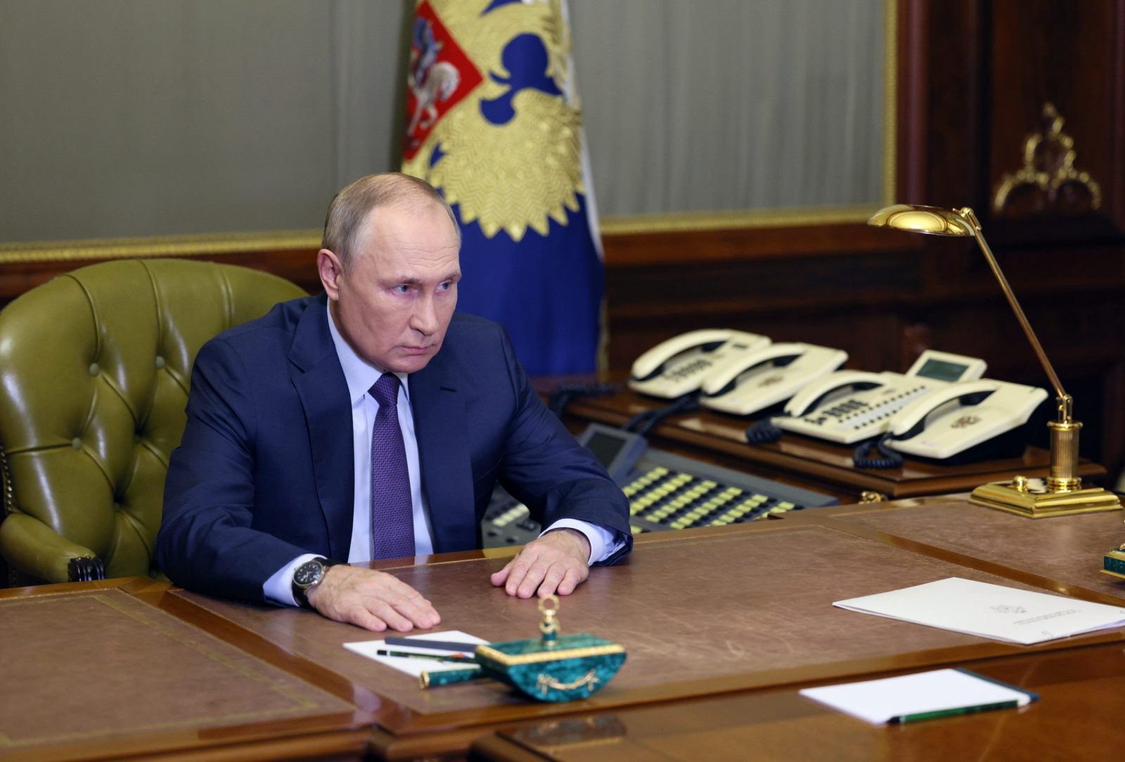 epa10233370 Russian President Vladimir Putin meets with Alexander Bastrykin (not pictured), head of the Investigative Committee of Russia, in St. Petersburg, Russia, 09 October 2022. A criminal case was opened under the article "Terrorism" following the previous day's explosion on the Crimean bridge spanning over Kerch Strait, the head of the Investigative Committee of the Russian Federation Alexander Bastrykin said. The attack on the Crimean bridge was performed by the Ukrainian special services, Russian President Putin said. The previous day, Russian authorities said that "an explosion was set off at a cargo vehicle on the motorway part of the Crimean bridge on the side of the Taman peninsula, which set fire to seven fuel tanks of a train that was en route to the Crimean peninsula. Two motorway sections of the bridge partially collapsed."  EPA/GAVRIIL GRIGOROV/SPUTNIK/KREMLIN POOL / POOL MANDATORY CREDIT