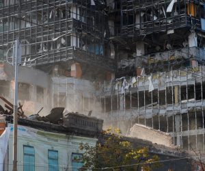 epaselect epa10234263 A damaged building after shelling in downtown Kyiv (Kiev), Ukraine, 10 October 2022. Explosions have been reported in several districts of the Ukrainian capital Kyiv on 10 October. At least nine people died and dozens injured as a result of rocket attacks, the State Emergency Service (SES) of Ukraine said. Russian troops entered Ukraine on 24 February 2022 starting a conflict that has provoked destruction and a humanitarian crisis.  EPA/SERGEY DOLZHENKO