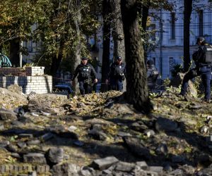 epa10234262 Police officers inspect an area after shelling in downtown Kyiv (Kiev), Ukraine, 10 October 2022. Explosions have been reported in several districts of the Ukrainian capital Kyiv on 10 October. At least nine people died and dozens injured as a result of rocket attacks, the State Emergency Service (SES) of Ukraine said. Russian troops entered Ukraine on 24 February 2022 starting a conflict that has provoked destruction and a humanitarian crisis.  EPA/OLEG PETRASYUK