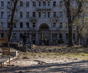 epa10234505 Police officers stand guard next to a damaged children's playground and buildings following missile strikes in downtown Kyiv (Kiev), Ukraine, 10 October 2022. Explosions have been reported in several districts of the Ukrainian capital Kyiv on 10 October. At least 11 people died and dozens injured as a result of rocket attacks targeting cities across Ukraine, the State Emergency Service (SES) of Ukraine said. Russian troops entered Ukraine on 24 February 2022 starting a conflict that has provoked destruction and a humanitarian crisis.  EPA/ROMAN PILIPEY