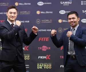 epa10235470 Former Filipino boxing star Manny Pacquiao (R) and South Korean mixed martial artist DK Yoo (L) pose for a photo during a news conference at the Press Center in Seoul, South Korea, 11 October 2022. Pacquiao will take on Yoo in an exhibition match in South Korea this winter to raise money for war-torn Ukraine.  EPA/YONHAP SOUTH KOREA OUT