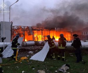 epa10235817 A handout photo released by the press service of the State Emergency Service (SES) of Ukraine on 11 October 2022 shows rescuers extinguishing a fire at the site of a missile strike in Zaporizhzhia, southeastern Ukraine. At least one person has died after Russian missile attacks on Zaporizhzhia hit public facilities, SES said on 11 October. Russian troops entered Ukraine on 24 February 2022 starting a conflict that has provoked destruction and a humanitarian crisis.  EPA/STATE EMERGENCY SERVICE OF UKRAI -- BEST QUALITY AVAILABLE -- MANDATORY CREDIT: STATE EMERGENCY SERVICE OF UKRAINE -- HANDOUT EDITORIAL USE ONLY/NO SALES