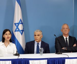 epa10239112 Israeli Prime Minister Yair Lapid (C), Defense Minister Benny Gantz (R) and Minister of Energy Karin Elharar (L) deliver a media statement regarding the maritime agreement between Israel and Lebanon at the Prime Minister's office in Jerusalem, 12 October 2022. The agreement focuses at Karish gas drilling site operated by Energean company and located in the Mediterranean Sea, in the economic waters of Israel, about 90 kilometers west of the coast of Israel, near the northern border between Israel and Lebanon.  EPA/ABIR SULTAN