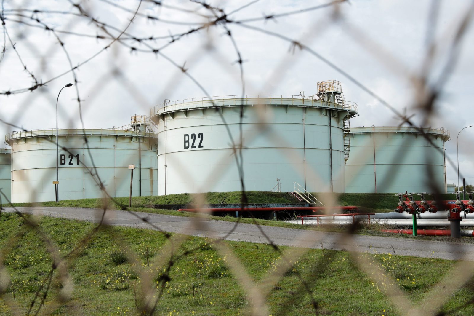epa10243739 Oil tanks at TotalEnergies fuel depot in Mardyck near Dunkerque, France, 14 October 2022. Since 27 September, General Confederation of Labour (CGT) and other trade unions have been on strike to improve working conditions in the face of inflation. The strike at refineries affected the country's domestic fuel output and caused shortage at French gas stations.  EPA/TERESA SUAREZ