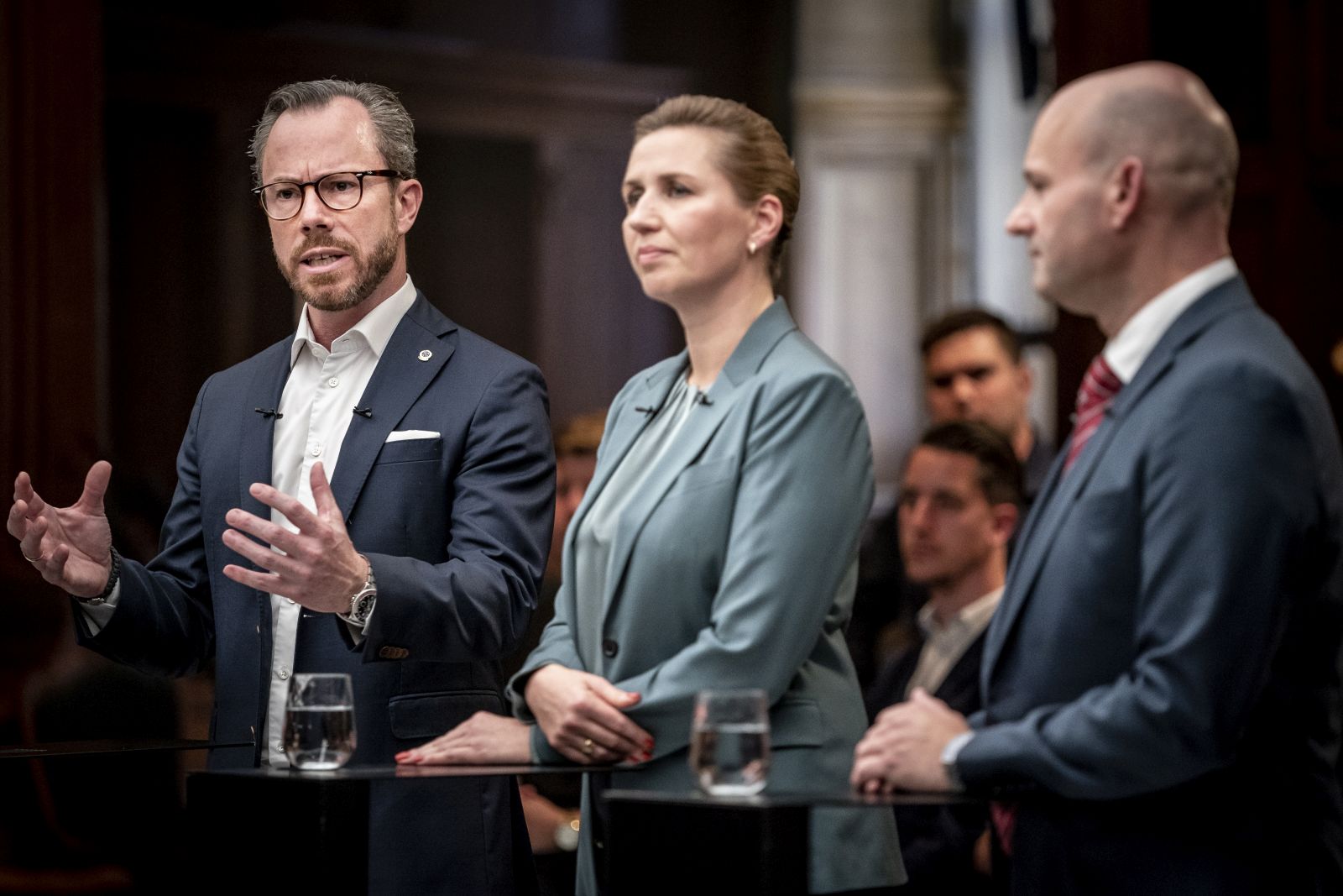 epa10248323 (L-R) Jakob Ellemann-Jensen, chairman of Denmark's Liberal Party, Mette Frederiksen, chairman of the Social Democrats, and Soren Pape Poulasen (L), chairman of Conservative People's Party, attend a debate between candidates for the position of prime minister of Denmark, at the Danish Broadcasting Corporation in Copenhagen Denmark, 16 October 2022 (issued 17 October 2022). The general election will be held on 01 November 2022.  EPA/MADS CLAUS RASMUSSEN DENMARK OUT