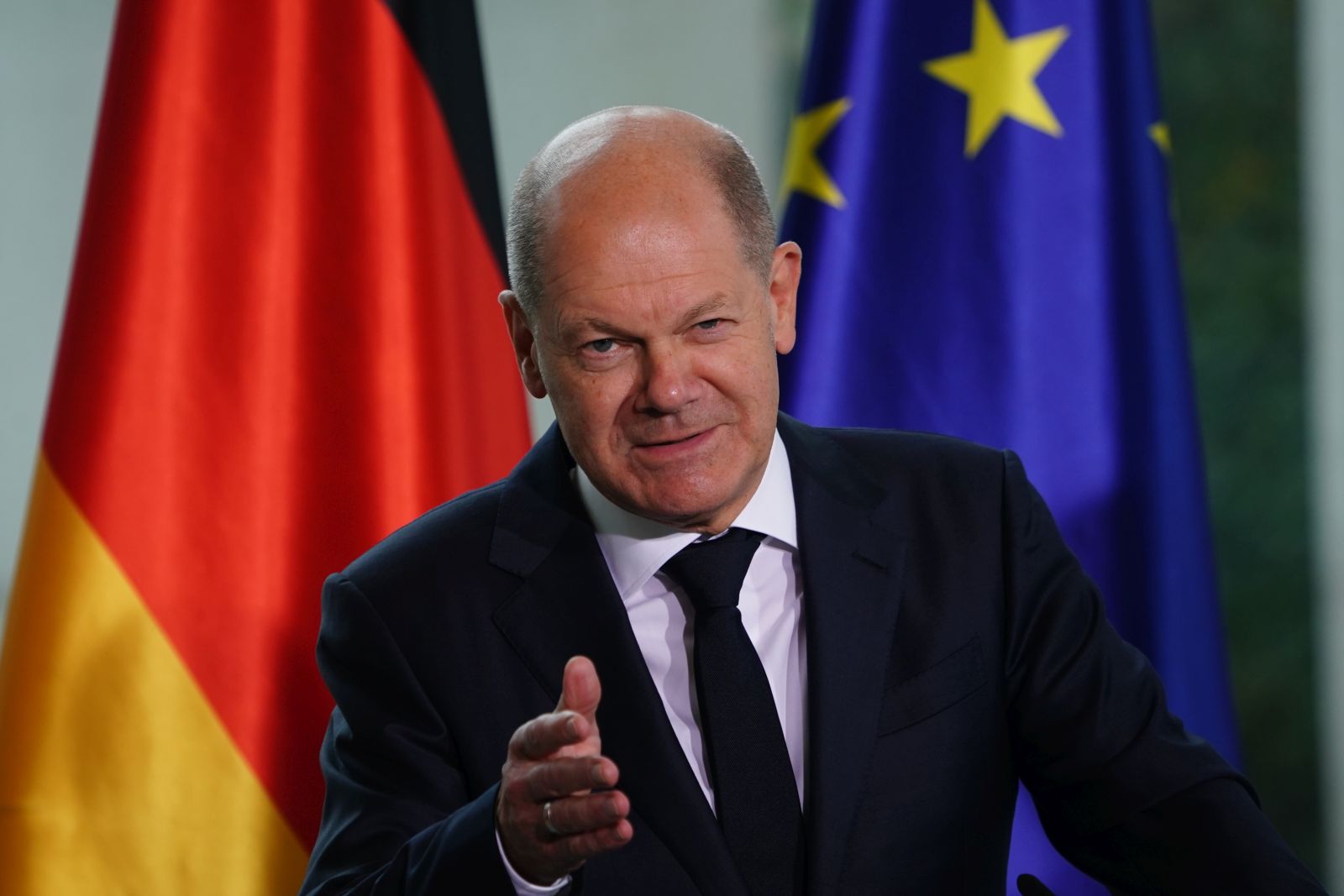 epa10250722 German Chancellor Olaf Scholz speaks during a press statement following a meeting of the 'Alliance for Transformation' at the Chancellery in Berlin, Germany, 18 October 2022. The meeting with representatives of business associations, trade unions, consumer and environment organizations is aimed at, among other topics, discussing possible solutions in the fields of digitalization and future energy policy.  EPA/CLEMENS BILAN