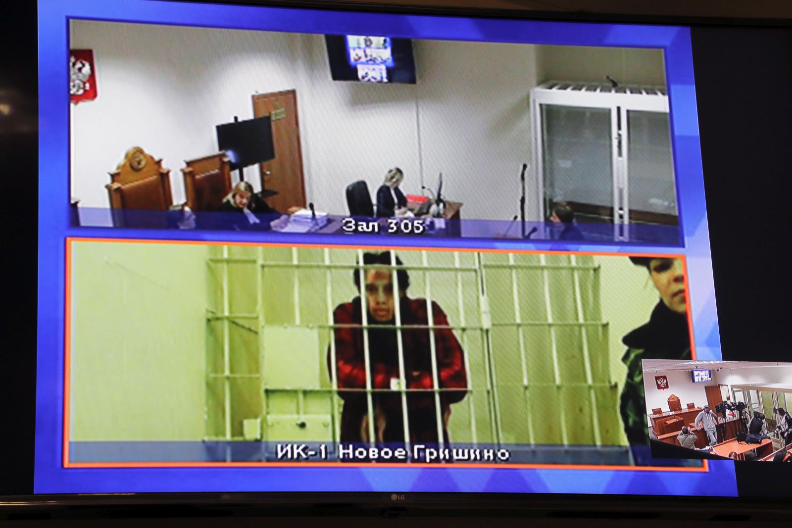 epa10264373 A screen shows two-time Olympic gold medalist and WNBA player Brittney Griner during a hearing of her appeal on vedict at the Moscow Regional Court in Krasnogorsk outside Moscow, Russia, 25 October 2022. Griner, a World Champion player of the WNBA's Phoenix Mercury team was arrested in February 2022 at Moscow's Sheremetyevo Airport after some hash oil was detected and found in her luggage. In August Griner was found guilty on charges of drug smuggling and was sentenced to nine years in prison.  EPA/MAXIM SHIPENKOV