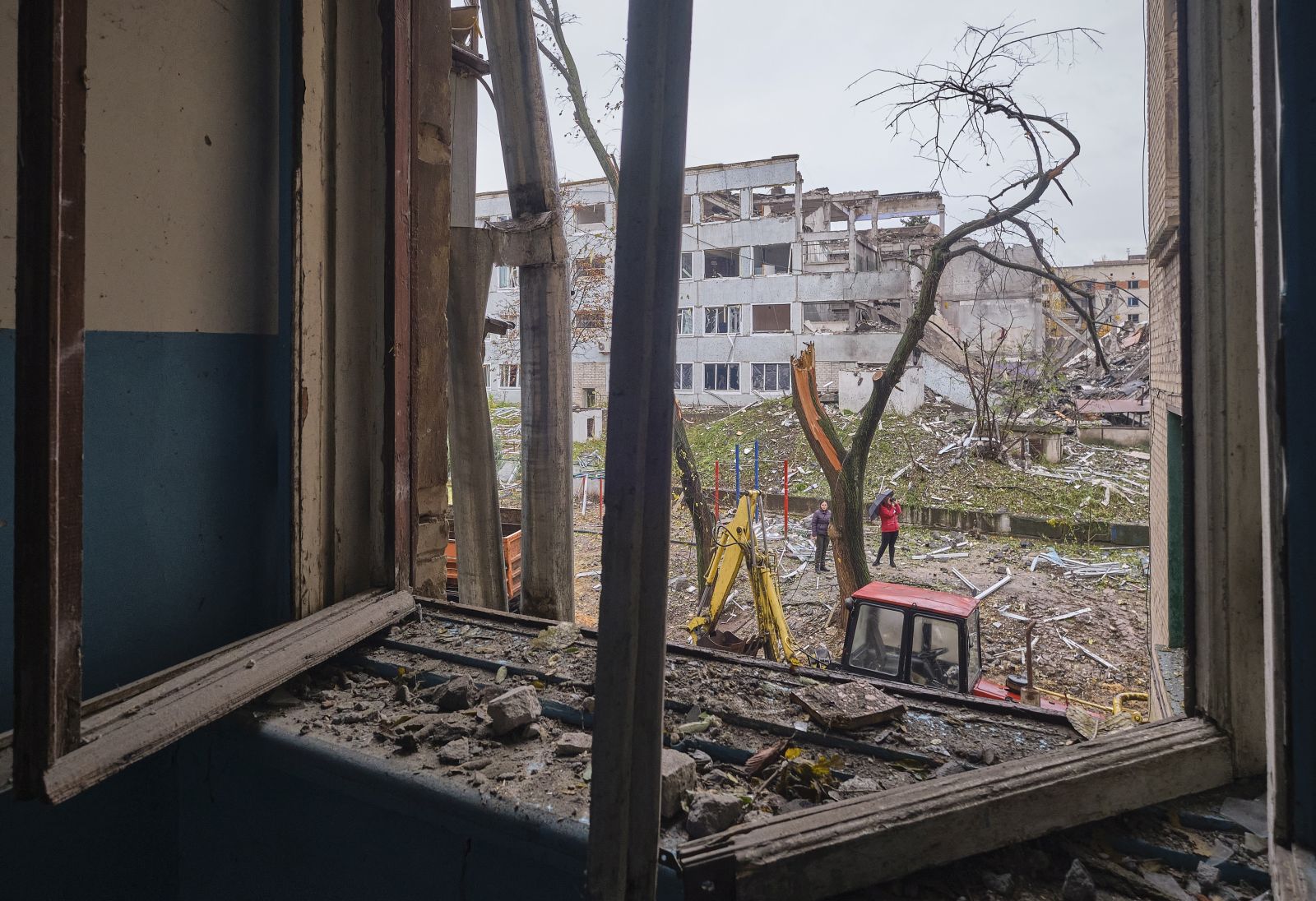 epa10267253 A local man looks out from a window of his flat in a residential building damaged in an overnight shelling in the small city of Druzhkivka, Donetsk area, Ukraine, 26 October 2022, amid the Russian invasion. The Ukrainian army pushed Russian troops from occupied territory in the northeast of the country in a counterattack. Russian troops on 24 February entered Ukrainian territory, starting a conflict that has provoked destruction and a humanitarian crisis.  EPA/YEVGEN HONCHARENKO