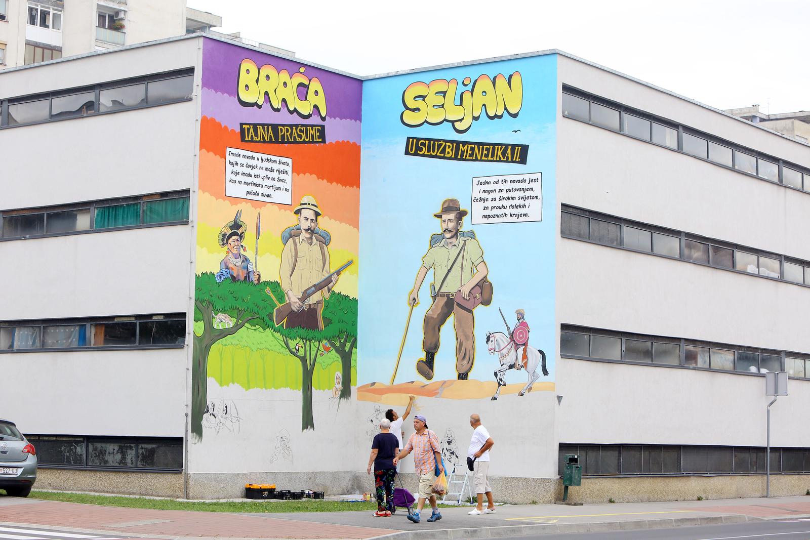 31.08.2020., Karlovac - U karlovackoj gradskoj cetvrti Novi centar nastavili su sa oslikavanjem murala na zgradama. I dok je na jednoj strani zgrade dovrsen mural  Jakova Sasela i Dragutina Lermana autora Leonarda Lesica, mural Braci Seljan na kojem radi Dalibor Juras je u zavrsnoj fazi.rPhoto: Kristina Stedul Fabac/PIXSELL