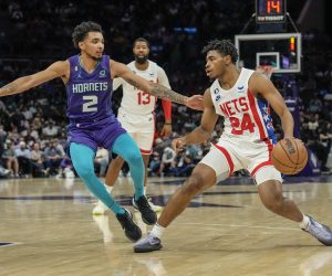 Nov 5, 2022; Charlotte, North Carolina, USA; Brooklyn Nets guard Cam Thomas (24) handles the ball against Charlotte Hornets guard James Bouknight (2) during the second quarter at Spectrum Center. Mandatory Credit: Jim Dedmon-USA TODAY Sports