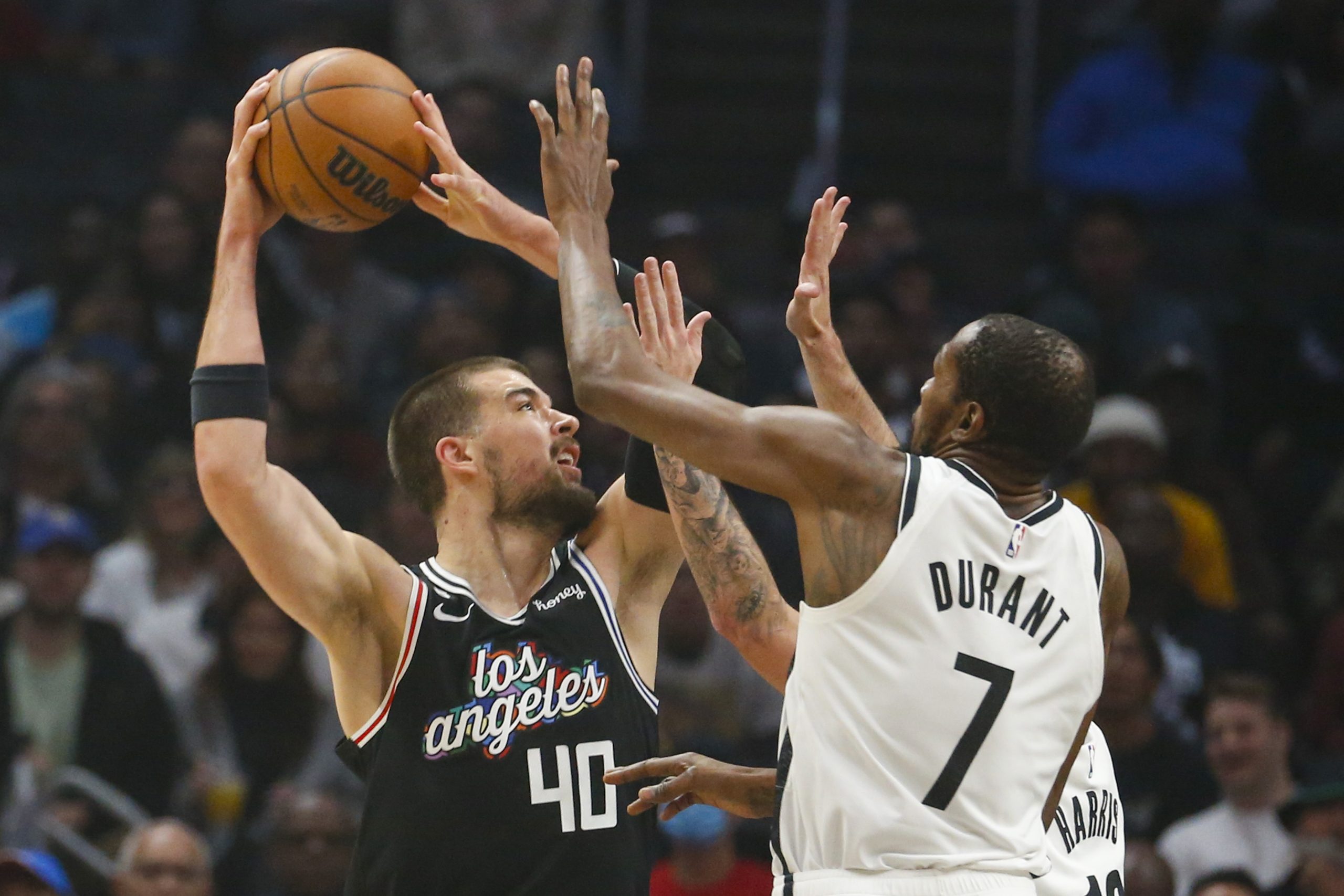 Los Angeles Clippers center Ivica Zubac (40) shoots against Brooklyn Nets guard Brooklyn Nets forward Kevin Durant (7) during an NBA basketball game Saturday, November 12, 2022, in Los Angeles. (Ringo Chiu via AP)