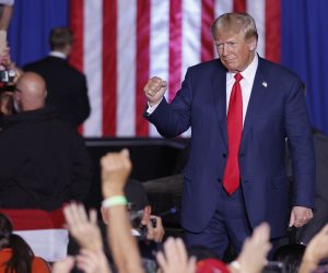 epa10232079 Former US President Donald J. Trump greets supporters at the start of the Save America rally at the Minden-Tahoe Airport in Minden, Nevada, USA, 08 October 2022. Trump is holding rallys for congressional candidates he supports in the run-up to the mid-term elections.  EPA/PETER DASILVA
