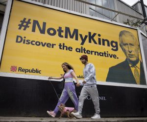 epa10277236 People walk past an anti-monarchy billboard featuring 'NotMyKing' hashtag and picture of Britain's King Charles III, made by the pressure group Republic, in London, Britain, 31 October 2022. Activists campaigning for the abolition of the monarchy in Britain make their first push since the death of Queen Elizabeth II with the launch of the billboards in 18 towns.  EPA/TOLGA AKMEN
