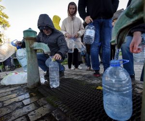 epa10277228 People take water from a water pump in Kyiv, Ukraine, 31 October 2022. "Part of the capital has been left without power as a result of strikes on critical infrastructure facilities. There is no running water in several of the city’s districts," Kyiv mayor Klitschko said. Russian troops on 24 February entered Ukrainian territory, starting a conflict that has provoked destruction and a humanitarian crisis.  EPA/OLEG PETRASYUK